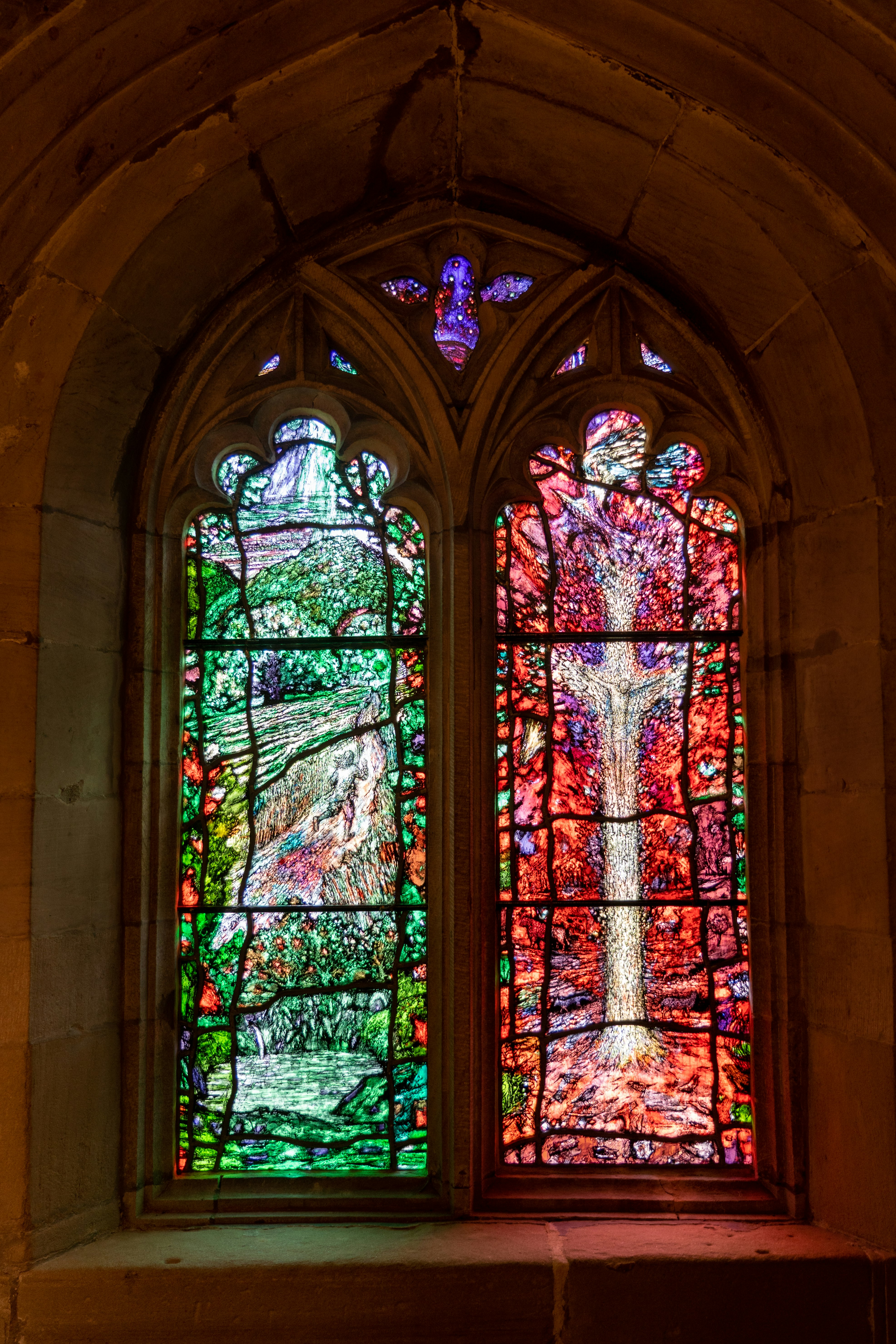 red green and brown floral glass window